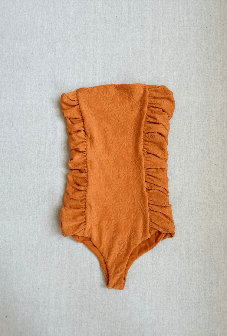 STRAPLESS RUCHED SIDE ONE PIECE IN ORANGE TERRY